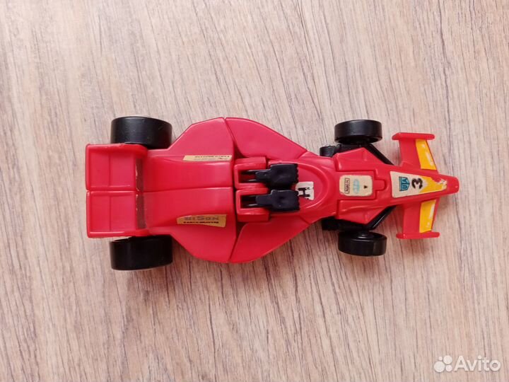 Робот трансформер формула-1 из 90 годов
