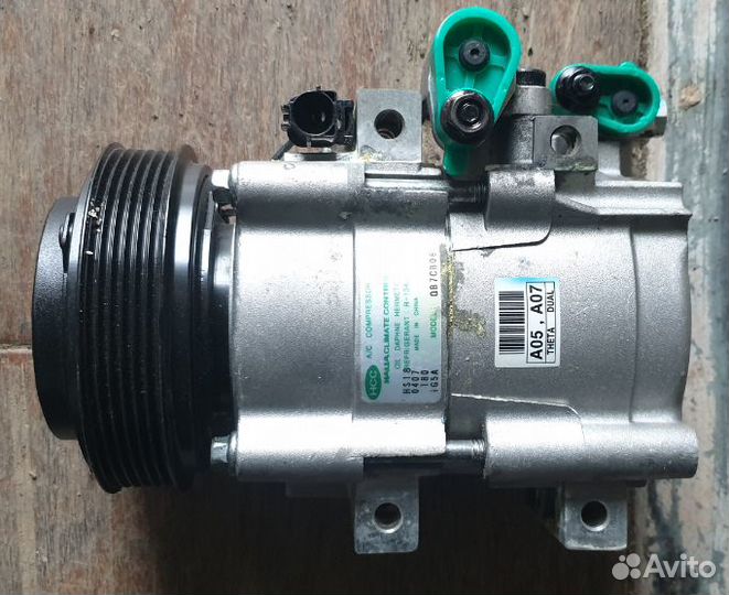 Компрессор кондиционера 977014H100 Grand Starex