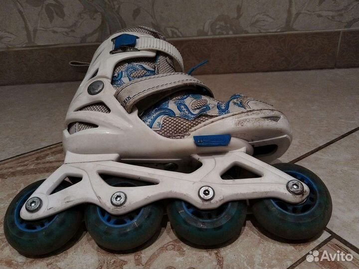 Роликовые коньки