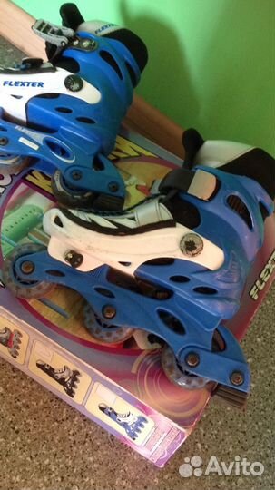 Роликовые коньки