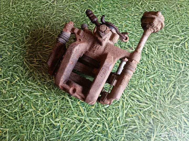 Суппорт задний левый Опель Астра J 2012 г