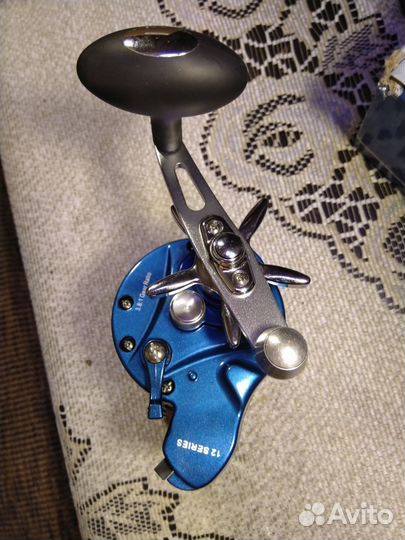 Спиннинг и катушка для троллинга новые