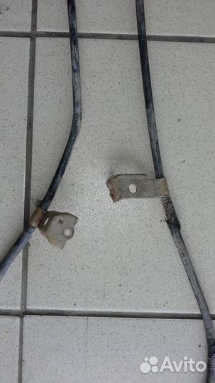 Тросик ручника Geely MK