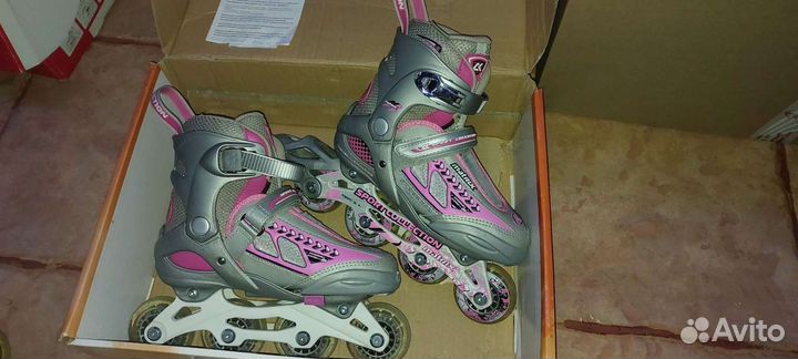 Роликовые коньки