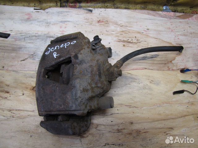 Суппорт правый Daewoo Espero