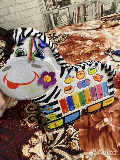 Музыкальная игрушка Зебра