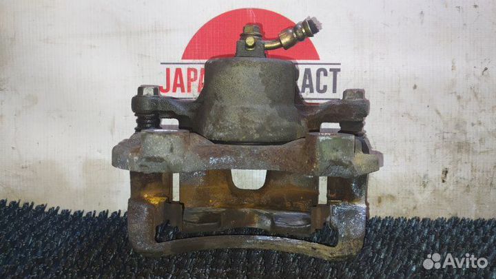 Суппорт передний правый Nissan Avenir RW11 QR20DE