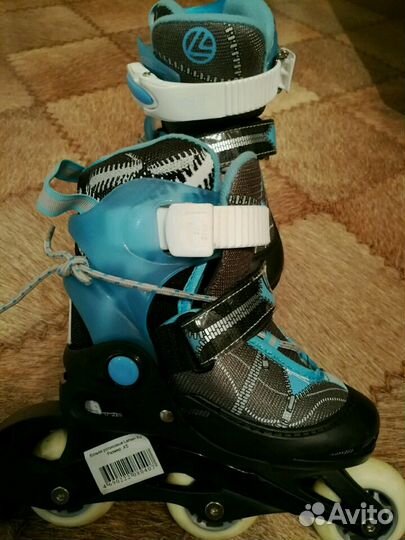 Роликовые коньки