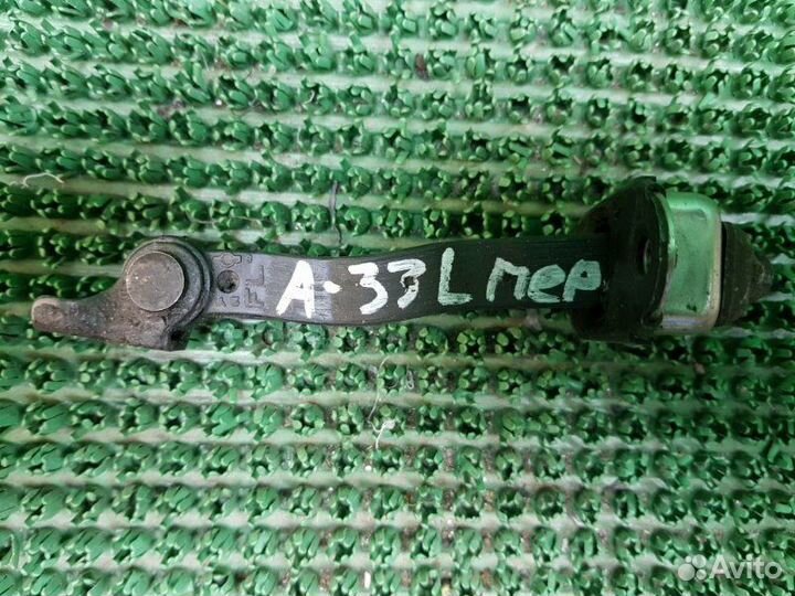 Ограничитель двери передний левый Nissan Maxima