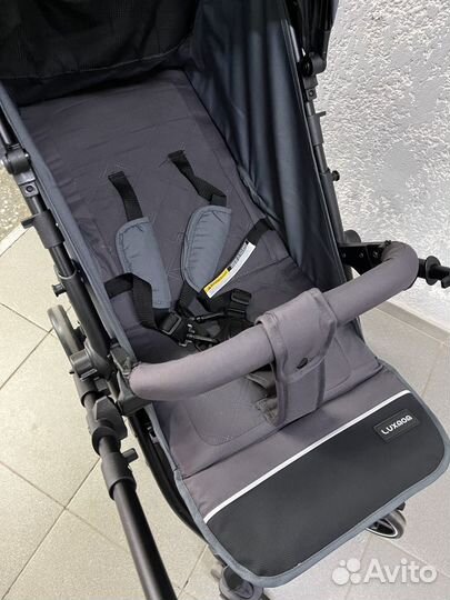 Коляска с перекидной ручкой Luxmom 3102