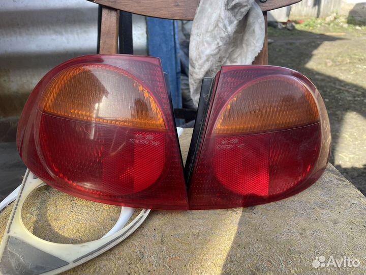 Задние фонари toyota caldina st 210-215