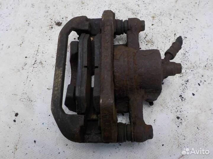 Суппорт задний левый chevrolet evanda