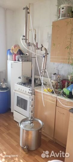 Самогонный аппарат с колонной и узлом отбора