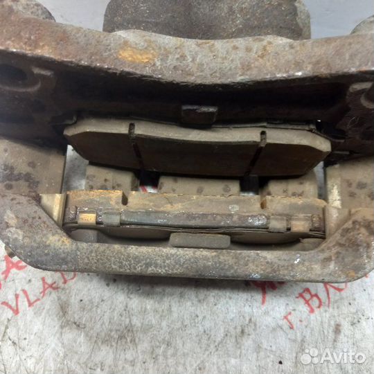 Суппорт тормозной передний левый Nissan Murano Z51