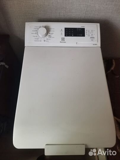 Стиральная машина с вертикальной загрузкой