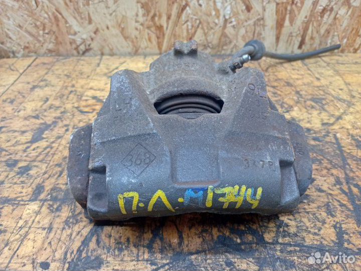 Суппорт тормозной передний левый Renault Duster