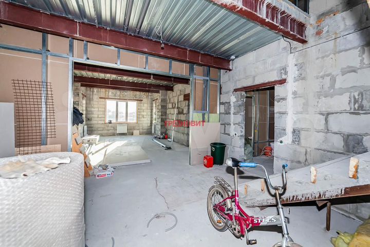 Коттедж 411 м² на участке 12 сот.