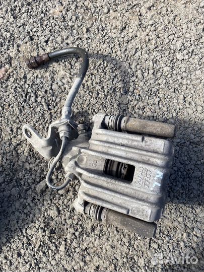 Суппорт задний левый Golf 6