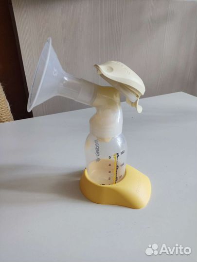 Молокоотсос medela ручной