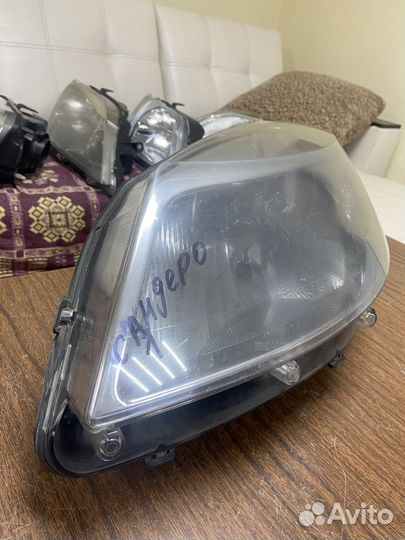 Фара левая Renault Sandero 1 09-14г