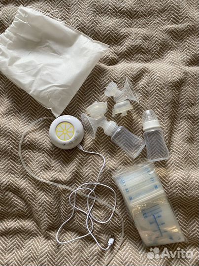 Молокоотсос электрический с пакетами для молока