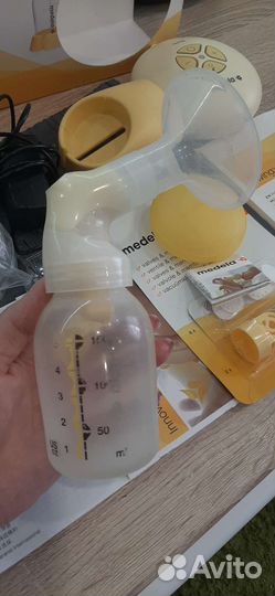 Молокоотсос medela swing