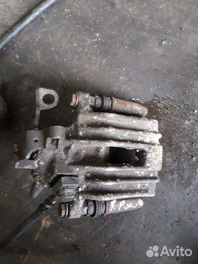 Суппорт задний тормозной Volkswagen Polo Skoda Rap