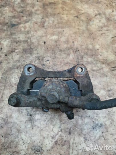 Суппорт тормозной задний правый Chevrolet Lacetti