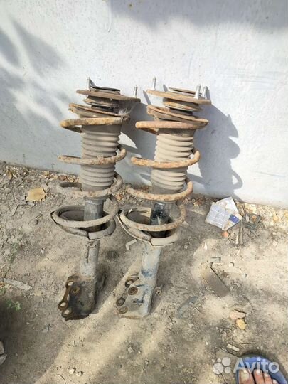 Стойки передние geely mk в сборе