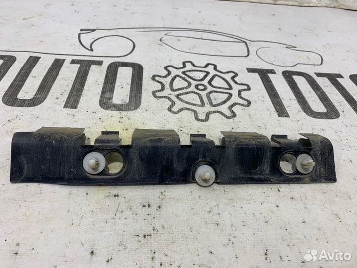 Кронштейн бампера задний левый Renault Logan