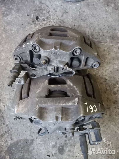 Суппорт передний левый правый ауди А6 С6 в сборе