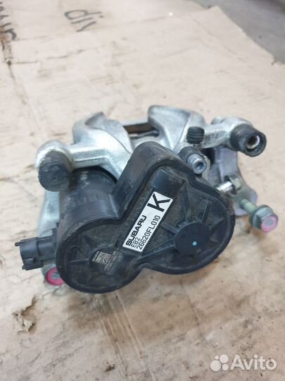 Суппорт со скобой задний левый Subaru Impreza G14