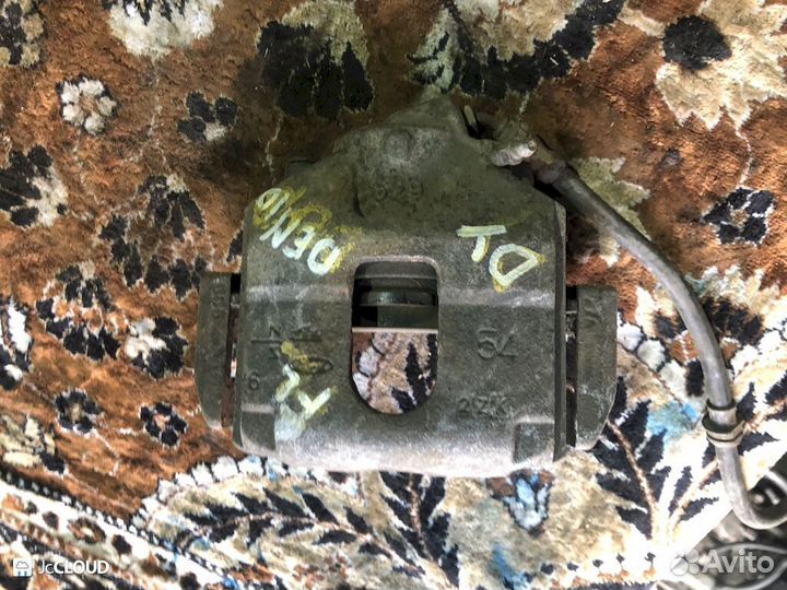 Суппорт на mazda demio DY3W