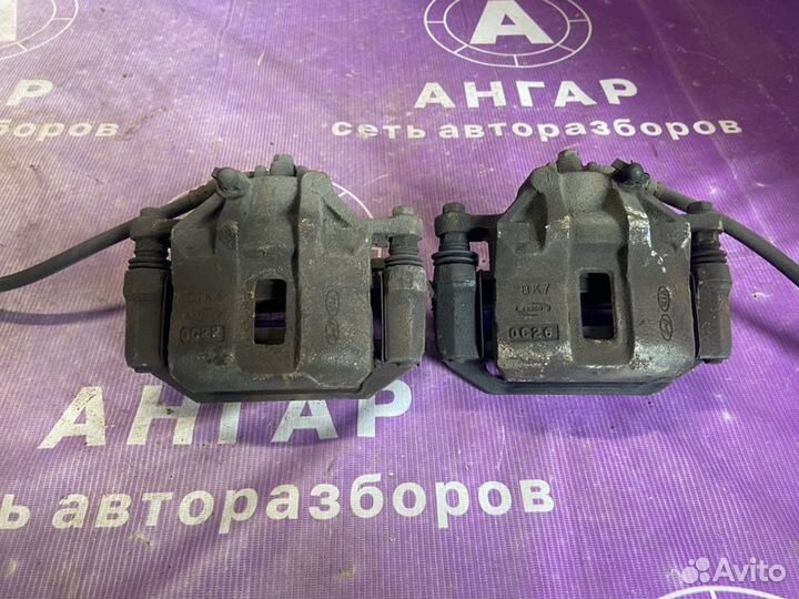 Суппорта передняя Kia Rio 2 JB G4EE 2010