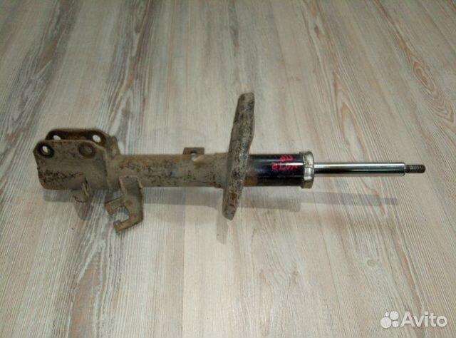 Амортизатор стойка перед Nissan note E11 Прав