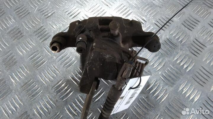 Суппорт задний левый Nissan Primera P12 (02-08)