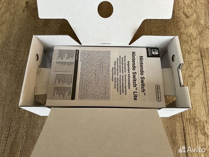 Игровая приставка Nintendo Switch Lite серый рст