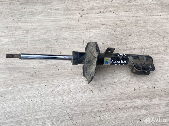 Амортизатор передний левый Toyota Corolla Spacio E
