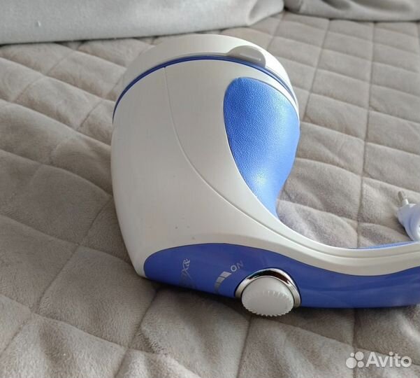 Электрический вибромассажер