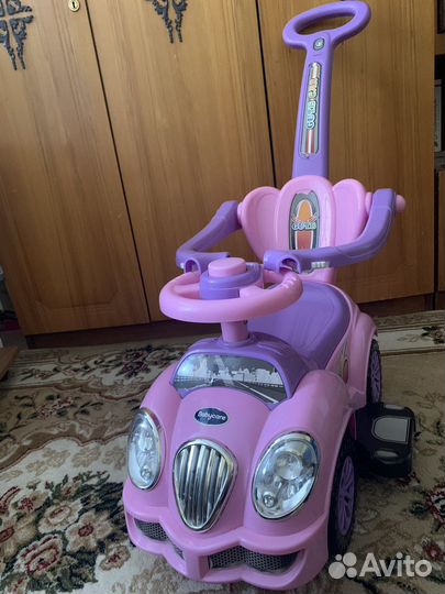 Машина каталка с ручкой