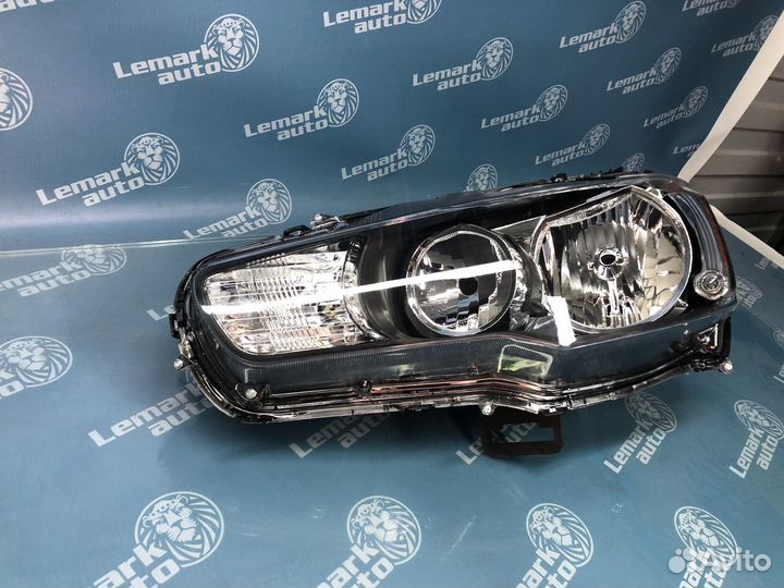 Фара левая на Mitsubishi Lancer 10