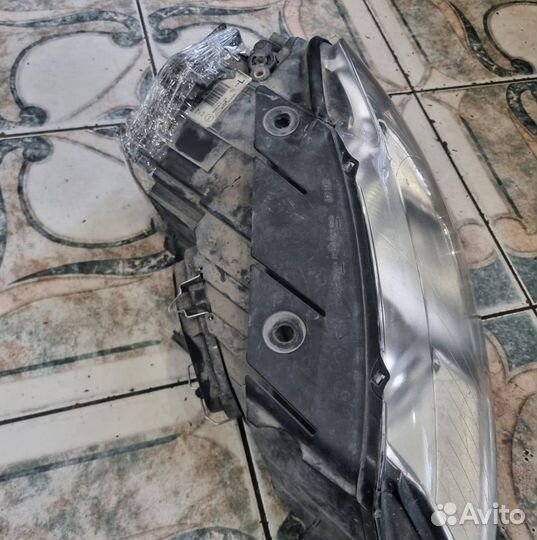 Фара Volkswagen Passat B6