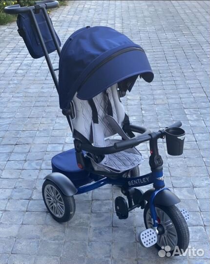 Трехколесный велосипед с ручкой