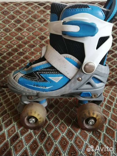 Роликовые коньки