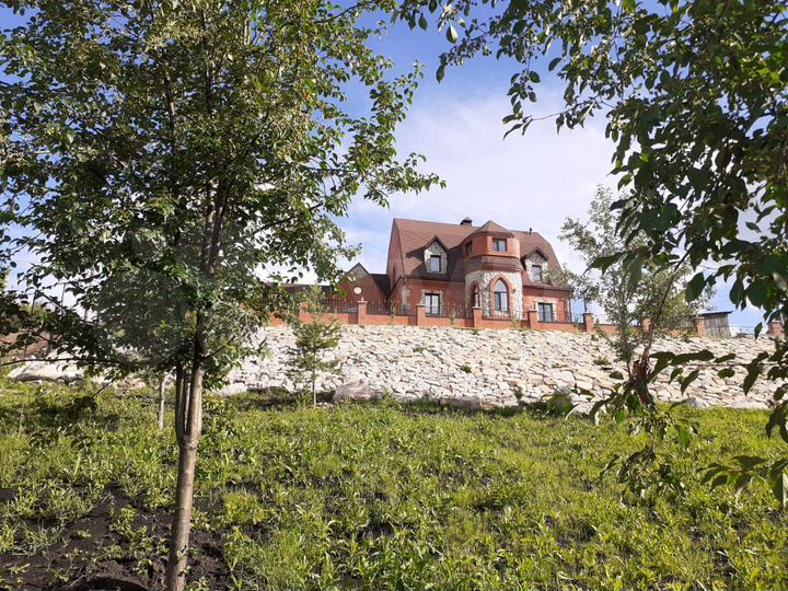 Коттедж 452 м² на участке 24 сот.