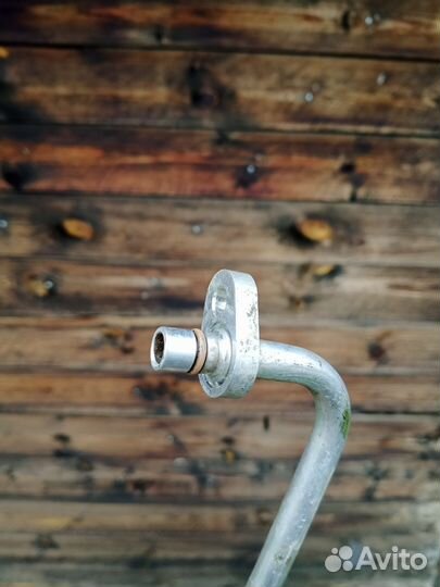 Трубка кондиционера Рено Логан/Ларгус