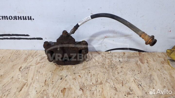 Суппорт тормозной задний правый Nissan Teana