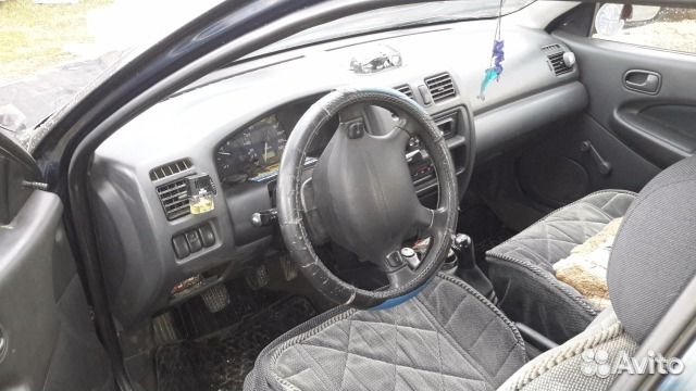 Mazda 323 2.0 МТ, 1997, битый, 280 000 км