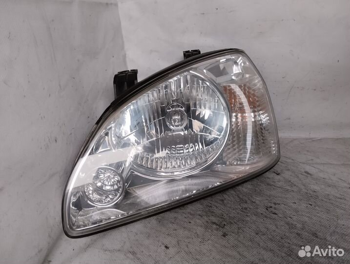 Фара левая Kia Carens 2002 - 2006 год