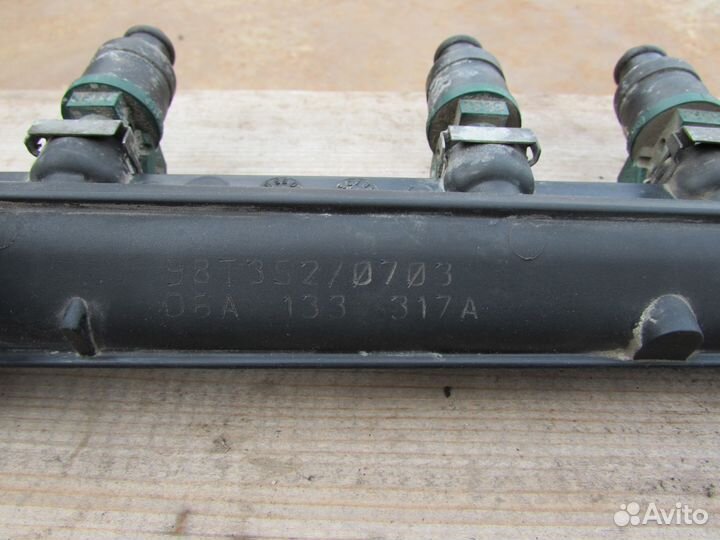 06A133317A Распределитель топлива (рампа)